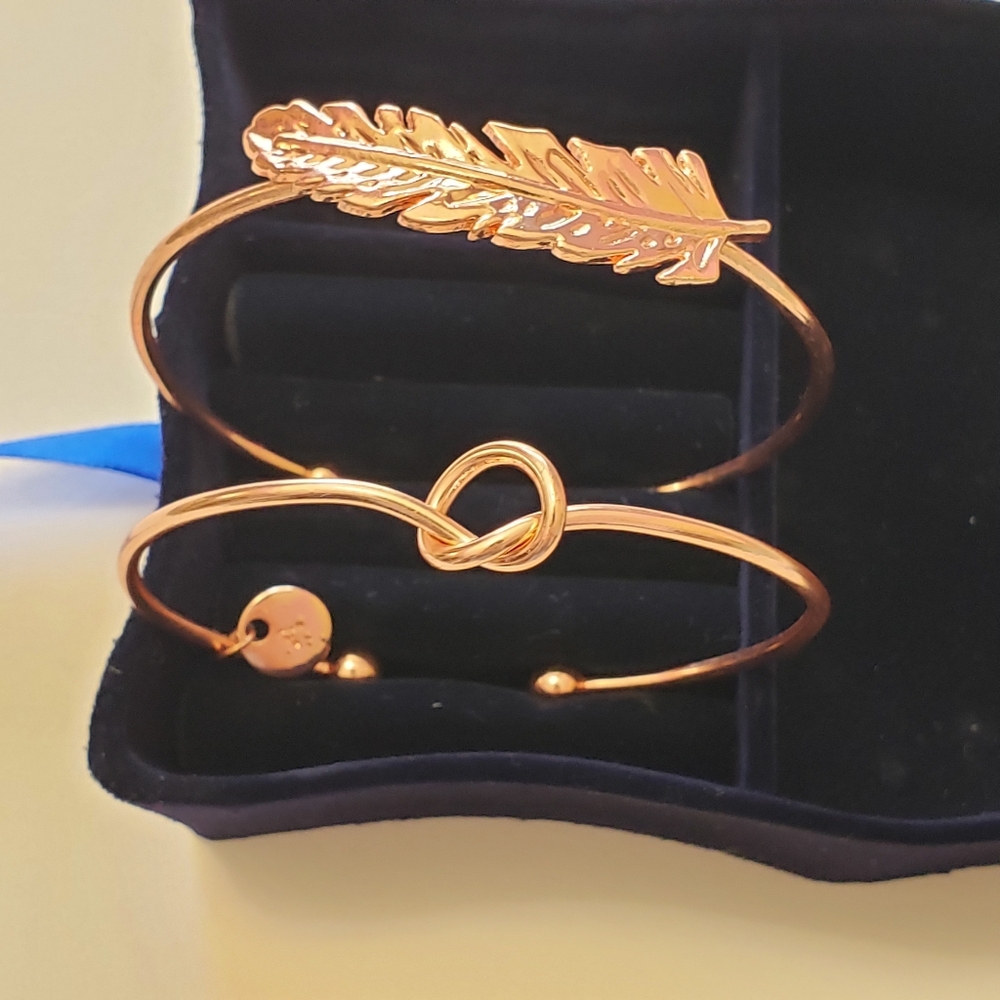 Rose gold tone Bracelets,  one is feather and one is Love knot